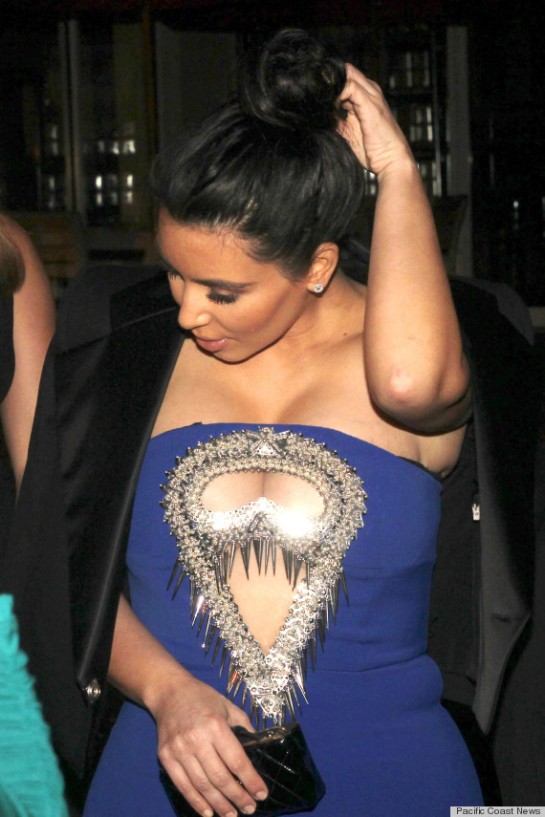 **EXCLUSIVE** Pregnant reality star Kim Kardashian poses with fans after dinner in Miami